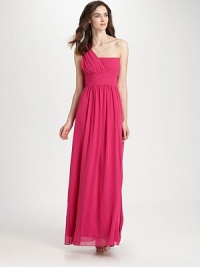 Equal parts elegant and playful, this eye-catching, asymmetrical style is a true show-stopper.Asymmetrical necklineRuched shoulder strapPleated bust and waistbandGathered skirtFully linedAbout 45 from natural waistPolyesterDry cleanImportedModel shown is 5'10 (177cm) wearing US size 4. Equal parts elegant and playful, this eye-catching, asymmetrical style is a true show-stopper.Asymmetrical necklineRuched shoulder strapPleated bust and waistbandGathered skirtFully linedAbout 45 from natural waistPolyesterDry cleanImportedModel shown is 5'10 (177cm) wearing US size 4.