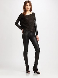 Shapely style with rich, leather-like sleeves and a shimmery knit body with a contoured hem. BoatneckDropped shouldersLong faux leather sleeves with knit cuffsContour cropped front hem with faux leather bandFully linedBody: 90% acetate/10% LurexTrim: polyesterDry cleanMade in USAModel shown is 5'10 (177cm) wearing US size Small. Shapely style with rich, leather-like sleeves and a shimmery knit body with a contoured hem. BoatneckDropped shouldersLong faux leather sleeves with knit cuffsContour cropped front hem with faux leather bandFully linedBody: 90% acetate/10% LurexTrim: polyesterDry cleanMade in USAModel shown is 5'10 (177cm) wearing US size Small.