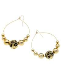 Get your wild on! Traditional gypsy hoops get a modern update in GUESS's leopard-printed style. Crafted in gold tone mixed metal with sparkling Colorado topaz glass and brown epoxy. Approximate diameter: 2 inches. Get your wild on! Traditional gypsy hoops get a modern update in GUESS's leopard-printed style. Crafted in gold tone mixed metal with sparkling Colorado topaz glass and brown epoxy. Approximate diameter: 2 inches.