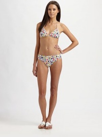 A fun, abstract print is always a viable swim option when catching rays.Halter strap ties at neckBack tie closureStretch bottom76% nylon/24% spandexHand washMade in USA of Italian fabric A fun, abstract print is always a viable swim option when catching rays.Halter strap ties at neckBack tie closureStretch bottom76% nylon/24% spandexHand washMade in USA of Italian fabric