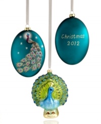 Peacock-theme beauty adorns your tree in these two ornaments, featuring intricate designs and shimmering sparkles. Oval ornament is shown front and back and reads: Christmas 2012. Peacock-theme beauty adorns your tree in these two ornaments, featuring intricate designs and shimmering sparkles. Oval ornament is shown front and back and reads: Christmas 2012.