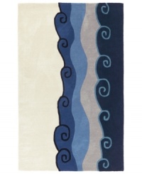 Retreat to a more serene space. Featuring a playful scene of deep blue waves crashing onto ivory sand, this casual rug is a treasure in any room. Hand-woven with Zealand wool, the rug offers a lush pile with softness you can sink your toes into. Retreat to a more serene space. Featuring a playful scene of deep blue waves crashing onto ivory sand, this casual rug is a treasure in any room. Hand-woven with Zealand wool, the rug offers a lush pile with softness you can sink your toes into.