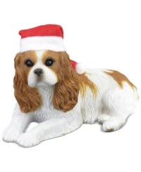 A fetching gift for animal lovers, the Cavalier King Charles Spaniel Christmas ornament depicts the adorable ruby pup waiting patiently for treats and dressed for the season. From Sandicast. A fetching gift for animal lovers, the Cavalier King Charles Spaniel Christmas ornament depicts the adorable ruby pup waiting patiently for treats and dressed for the season. From Sandicast.