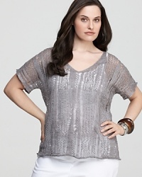 Bring casual glamour to your everyday look with this Eileen Fisher v-neck tee -- dusted in a light metallic finish and perfect for layering or standing alone. Bring casual glamour to your everyday look with this Eileen Fisher v-neck tee -- dusted in a light metallic finish and perfect for layering or standing alone.