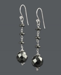 Disco-esque and totally dramatic. These glittering drop earrings feature faceted hematite beads (20-1/2 ct. t.w.) set in sterling silver. Approximate drop: 2 inches. Disco-esque and totally dramatic. These glittering drop earrings feature faceted hematite beads (20-1/2 ct. t.w.) set in sterling silver. Approximate drop: 2 inches.