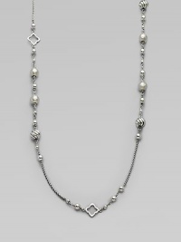 From the Quatrefoil Collection. An extra long sterling silver chain with bead and quatrefoil stations.Sterling silver Can be worn doubled Length, about 48 Lobster clasp closure Imported From the Quatrefoil Collection. An extra long sterling silver chain with bead and quatrefoil stations.Sterling silver Can be worn doubled Length, about 48 Lobster clasp closure Imported