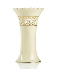 Distinguished by a scalloped edge, bands of gold and heart cutouts in creamy ivory porcelain, the lovely vase combines traditional style and timeless grace. Distinguished by a scalloped edge, bands of gold and heart cutouts in creamy ivory porcelain, the lovely vase combines traditional style and timeless grace.