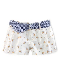 Pressed pleats, colorful florals and a preppy gingham belt give this warm-weather staple a decidedly darling update. Pressed pleats, colorful florals and a preppy gingham belt give this warm-weather staple a decidedly darling update.