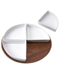 A smart and versatile go-to for entertaining, this modern lazy susan from The Cellar combines four porcelain sections in a platter of acacia wood. A smart and versatile go-to for entertaining, this modern lazy susan from The Cellar combines four porcelain sections in a platter of acacia wood.