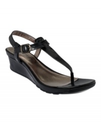 A natural fit. Kenneth Cole Reaction's Sun Made wedge sandals complement any and every look quite nicely.