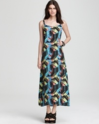 A graphic abstract print lends cutting-edge style to this Volcom dress, cut in a flowing maxi silhouette. A graphic abstract print lends cutting-edge style to this Volcom dress, cut in a flowing maxi silhouette.