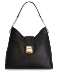 For glam girls on-the-go to ladies who like to lunch, this Calvin Klein design is the ultimate accessory. Sumptuous leather with a remarkably soft finish is complemented with gorgeous golden hardware and slender strap with chain-link stations, for a look that's altogether alluring. For glam girls on-the-go to ladies who like to lunch, this Calvin Klein design is the ultimate accessory. Sumptuous leather with a remarkably soft finish is complemented with gorgeous golden hardware and slender strap with chain-link stations, for a look that's altogether alluring.