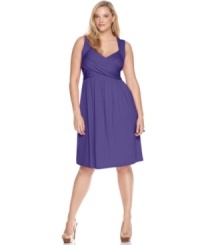 A crisscross front lends an elegant line to Spense's sleeveless plus size dress, accentuated by an empire waist-- look amazing from day to play! A crisscross front lends an elegant line to Spense's sleeveless plus size dress, accentuated by an empire waist-- look amazing from day to play!