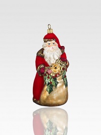 This elegantly robed vintage-style Santa of expertly mouth-blown, hand-painted glass shimmers with touches of gold and glitter.Glass9H X 4.5W X 4.5DImported This elegantly robed vintage-style Santa of expertly mouth-blown, hand-painted glass shimmers with touches of gold and glitter.Glass9H X 4.5W X 4.5DImported