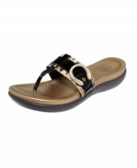 Walk away in comfortable style. The mtallic buckles add shine to the Mykos thong sandals by Circa by Joan and David.