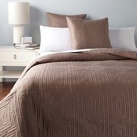 With its clean lines and geometric pattern, this decorative pillow adds richness and depth to the bed. With its clean lines and geometric pattern, this decorative pillow adds richness and depth to the bed.