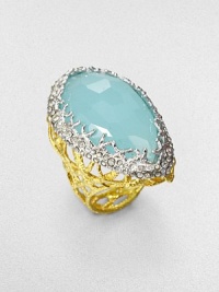 From the Elements Siyabona Collection. Atop an openwork woven band of glowing goldtone sits a faceted oval of pastel chalcedony, in an X-motif setting edged with shimmering Swarovski crystals.Peruvian chalcedonyCrystalGoldtone and rhodium platingLength, about 1.5Made in USA