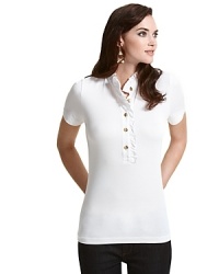 An update to the traditional polo -- pristine gold-tone buttons and feminine ruffles shake up a closet staple. Pair with jeans and Tory Burch flats for a crisp, American-girl look. An update to the traditional polo -- pristine gold-tone buttons and feminine ruffles shake up a closet staple. Pair with jeans and Tory Burch flats for a crisp, American-girl look.
