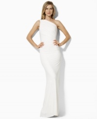 The sweeping glamour of a one-shoulder silhouette is captured in this petite matte jersey dress from Lauren by Ralph Lauren, embellished with delicate ruching and a dazzling crystal-encrusted accent. The sweeping glamour of a one-shoulder silhouette is captured in this petite matte jersey dress from Lauren by Ralph Lauren, embellished with delicate ruching and a dazzling crystal-encrusted accent.