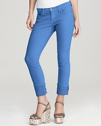 Rock spring's color trend in these vibrant Current/Elliott jeans. Slightly cropped for a chic look with towering wedges, the slim style is can't-miss with a tissue-thin tee and a statement necklace. Rock spring's color trend in these vibrant Current/Elliott jeans. Slightly cropped for a chic look with towering wedges, the slim style is can't-miss with a tissue-thin tee and a statement necklace.