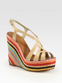 Multicolored espadrille wedge complemented by patent leather criss-cross straps and a slingback. Hemp wedge, 5 (125mm)Hemp platform, 1½ (40mm)Compares to a 3½ heel (90mm)Patent leather upperLeather lining and soleImportedOUR FIT MODEL RECOMMENDS ordering true size. Multicolored espadrille wedge complemented by patent leather criss-cross straps and a slingback. Hemp wedge, 5 (125mm)Hemp platform, 1½ (40mm)Compares to a 3½ heel (90mm)Patent leather upperLeather lining and soleImportedOUR FIT MODEL RECOMMENDS ordering true size.