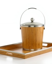 Modern style and ancient materials collide in this slick bamboo ice bucket. A silvertone metal lid and insulated design keep it cool when you're entertaining a crowd. (Clearance) Modern style and ancient materials collide in this slick bamboo ice bucket. A silvertone metal lid and insulated design keep it cool when you're entertaining a crowd. (Clearance)