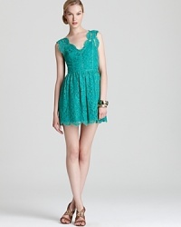 Lovely in lace and flaunting a vibrant jewel-tone hue, this Madison Marcus mini dress injects a playful sensibility into cocktail events. Lovely in lace and flaunting a vibrant jewel-tone hue, this Madison Marcus mini dress injects a playful sensibility into cocktail events.
