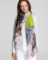 Add a touch of the tropics to your look with this vibrant, leaf-print scarf in sumptuous silk from DIANE von FURSTENBERG.