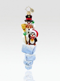 The friendly snowman found a new companion who likes to chill! Crafted from sparkling European glass, you're bound to fall in love with Frosty all over again. Hand-blownHand-painted7 tallMade in Poland The friendly snowman found a new companion who likes to chill! Crafted from sparkling European glass, you're bound to fall in love with Frosty all over again. Hand-blownHand-painted7 tallMade in Poland