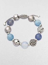 From the Elements Collection. Rich textures and soft shades combine in a stunning strand of 14mm sterling silver, blue chalcedony, aquamarine and moon quartz beads with a silver oval slide clasp.Blue chalcedony, aquamarine and moon quartzSterling silverDiameter, about 2Adjustable slide claspImported From the Elements Collection. Rich textures and soft shades combine in a stunning strand of 14mm sterling silver, blue chalcedony, aquamarine and moon quartz beads with a silver oval slide clasp.Blue chalcedony, aquamarine and moon quartzSterling silverDiameter, about 2Adjustable slide claspImported