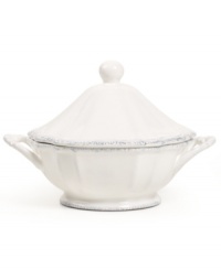 A fluted base and delicate scalloped edge with distressed detail give the Blanc tureen the classic, romantic feel of Versailles Maison's charming dinnerware collection. A fluted base and delicate scalloped edge with distressed detail give the Blanc tureen the classic, romantic feel of Versailles Maison's charming dinnerware collection.