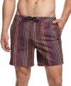 Take the direct line to warm-weather style and fun with these striped board shorts from Calvin Klein.