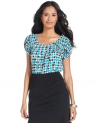 Add a pop of color to your work ensemble with Style&co.'s vibrantly printed top.