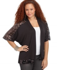 Glimmer from day to night with ING's elbow sleeve plus size cardigan, featuring sequined trim. Glimmer from day to night with ING's elbow sleeve plus size cardigan, featuring sequined trim.