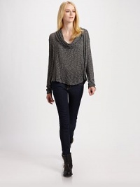 Draped cowlneck with long dolman sleeves and a tastefully textured look. CowlneckLong dolman sleeves62% viscose/33% polyester/5% spandexDry cleanMade in USA Draped cowlneck with long dolman sleeves and a tastefully textured look. CowlneckLong dolman sleeves62% viscose/33% polyester/5% spandexDry cleanMade in USA