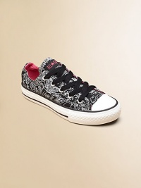 A fun contrasting print adds a touch of whimsy to this classic wardrobe staple. Lace-upCotton upperTextile liningRubber soleTraditional Chuck insoleImported A fun contrasting print adds a touch of whimsy to this classic wardrobe staple. Lace-upCotton upperTextile liningRubber soleTraditional Chuck insoleImported