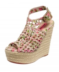 Cutting-edge cut outs and pretty colorful prints. Betsey Johnson's Beckeyy wedge sandals are a season must-have. Cutting-edge cut outs and pretty colorful prints. Betsey Johnson's Beckeyy wedge sandals are a season must-have.