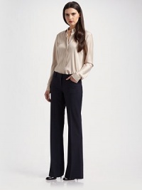 Flare-leg style with slash pockets and a hint of stretch. Button closure Zip fly Slash pockets Inseam, about 34 94% polyurethane/6% spandex Dry clean Made in USA of Italian fabric Flare-leg style with slash pockets and a hint of stretch. Button closure Zip fly Slash pockets Inseam, about 34 94% polyurethane/6% spandex Dry clean Made in USA of Italian fabric