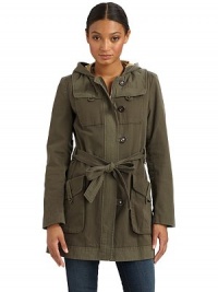 Sharply tailored utility look styled with tonal fabric inserts, a tie-belt and rhinestone-embellished buttons.Hooded silhouette Concealed front zipper Button-and-loop front Long sleeves with button details Tie-belt Button flap pockets Dual vented hem with buttons at back Fully lined About 30 from shoulder to hem Shell: 97% cotton/3% elastane Second fabric: 55% flax/45% cotton Dry clean Imported Sharply tailored utility look styled with tonal fabric inserts, a tie-belt and rhinestone-embellished buttons.Hooded silhouette Concealed front zipper Button-and-loop front Long sleeves with button details Tie-belt Button flap pockets Dual vented hem with buttons at back Fully lined About 30 from shoulder to hem Shell: 97% cotton/3% elastane Second fabric: 55% flax/45% cotton Dry clean Imported