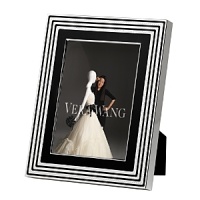 This new collection from bridal favorite Vera Wang updates the designer's popular With Love collection in striking black enamel and silver. Featuring a geometric design, it is at once Art Deco-inspired and thoroughly modern. This new collection from bridal favorite Vera Wang updates the designer's popular With Love collection in striking black enamel and silver. Featuring a geometric design, it is at once Art Deco-inspired and thoroughly modern.
