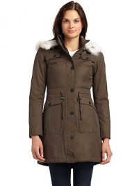 THE LOOKRemovable fox fur-lined hoodDual zip pockets with snap detail at chestZip front with snap closureDrawstring tie at waistDual snap pocket with angled seam pocketsLong sleeves with snap cuffsVented back hemTHE FITAbout 34 from shoulder to hemTHE MATERIALCotton/nylonFur: natural fox furFully linedCARE & ORIGINDry cleanImportedFur origin: made in ChinaModel shown is 5'9 (175cm) wearing US size Small. THE LOOKRemovable fox fur-lined hoodDual zip pockets with snap detail at chestZip front with snap closureDrawstring tie at waistDual snap pocket with angled seam pocketsLong sleeves with snap cuffsVented back hemTHE FITAbout 34 from shoulder to hemTHE MATERIALCotton/nylonFur: natural fox furFully linedCARE & ORIGINDry cleanImportedFur origin: made in ChinaModel shown is 5'9 (175cm) wearing US size Small.