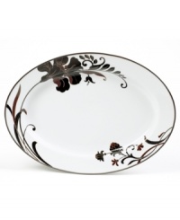 Like a well-manicured flower bed the Cocoa Blossom dinnerware and dishes collection from Mikasa brings just the right amounts of whimsy and sophistication to the table. Rich hues of chocolate and cinnamon color the lush blooms beautifully set against elegant white porcelain. Like a well-manicured flower bed the Cocoa Blossom dinnerware and dishes collection from Mikasa brings just the right amounts of whimsy and sophistication to the table. Rich hues of chocolate and cinnamon color the lush blooms beautifully set against elegant white porcelain.
