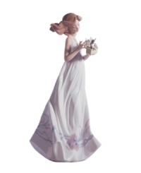 Enchanted by the quiet beauty of butterflies, this pretty young woman has a sense of sweet innocence in handcrafted porcelain. A classic figurine for the Lladro collector. Enchanted by the quiet beauty of butterflies, this pretty young woman has a sense of sweet innocence in handcrafted porcelain. A classic figurine for the Lladro collector.
