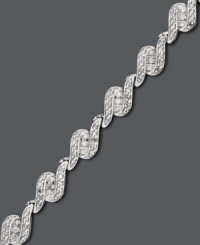 Have her unwrap the perfect gift this season. This stunning tennis bracelet by Wrapped in Love™ features three sleek rows of round-cut diamonds (1 ct. t.w.) set in 14k white gold. Approximate length: 7-1/4 inches. Have her unwrap the perfect gift this season. This stunning tennis bracelet by Wrapped in Love™ features three sleek rows of round-cut diamonds (1 ct. t.w.) set in 14k white gold. Approximate length: 7-1/4 inches.
