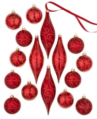 Red balls, drop ornaments and swirls of gold glitter transform your tree into a dazzling spectacle. From Holiday Lane. Red balls, drop ornaments and swirls of gold glitter transform your tree into a dazzling spectacle. From Holiday Lane.