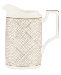 Dressed in a fine diamond grid of bronze and warm taupe, this creamer is tailored for formal dining and everyday elegance. A hooked handle architects a unique silhouette to enhance more classic bone china essentials. From Noritake's collection of serveware and serving dishes. Dressed in a fine diamond grid of bronze and warm taupe, this creamer is tailored for formal dining and everyday elegance. A hooked handle architects a unique silhouette to enhance more classic bone china essentials. From Noritake's collection of serveware and serving dishes.
