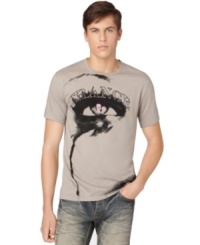 A cool graphic of an eye with a skull pupil and trance printed above, gives this Calvin Klein Jeans tee its edgy artsy style. A cool graphic of an eye with a skull pupil and trance printed above, gives this Calvin Klein Jeans tee its edgy artsy style.