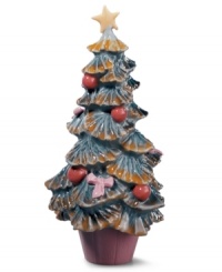 An interesting variation on the classic Christmas tree, Lladro's mini Christmas tree figurine is painted with Lladro's signature palette of soft pastels finished with a high-gloss glaze that catches the eyes. Handcrafted in Spain of pure porcelain. An interesting variation on the classic Christmas tree, Lladro's mini Christmas tree figurine is painted with Lladro's signature palette of soft pastels finished with a high-gloss glaze that catches the eyes. Handcrafted in Spain of pure porcelain.
