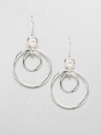 From the Scultura Collection. Circular sterling silver hoops accented with luminous mother-of-pearl in a pretty drop design. Mother-of-pearlSterling silverDrop, about 1.9Hook backImported 