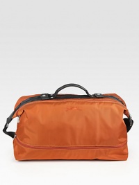 Great for travel, the gym and everywhere in between, constructed in lightweight, yet durable nylon.Zip closureTop handlesAdjustable shoulder strapInterior zip pocketFully linedPolyamide20W x 12H x 10DImported Great for travel, the gym and everywhere in between, constructed in lightweight, yet durable nylon.Zip closureTop handlesAdjustable shoulder strapInterior zip pocketFully linedPolyamide20W x 12H x 10DImported